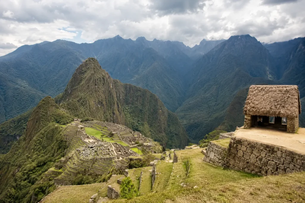Machu Picchu history — panoramic view of the 15th century Inca citadel from the guardian hut viewpoint